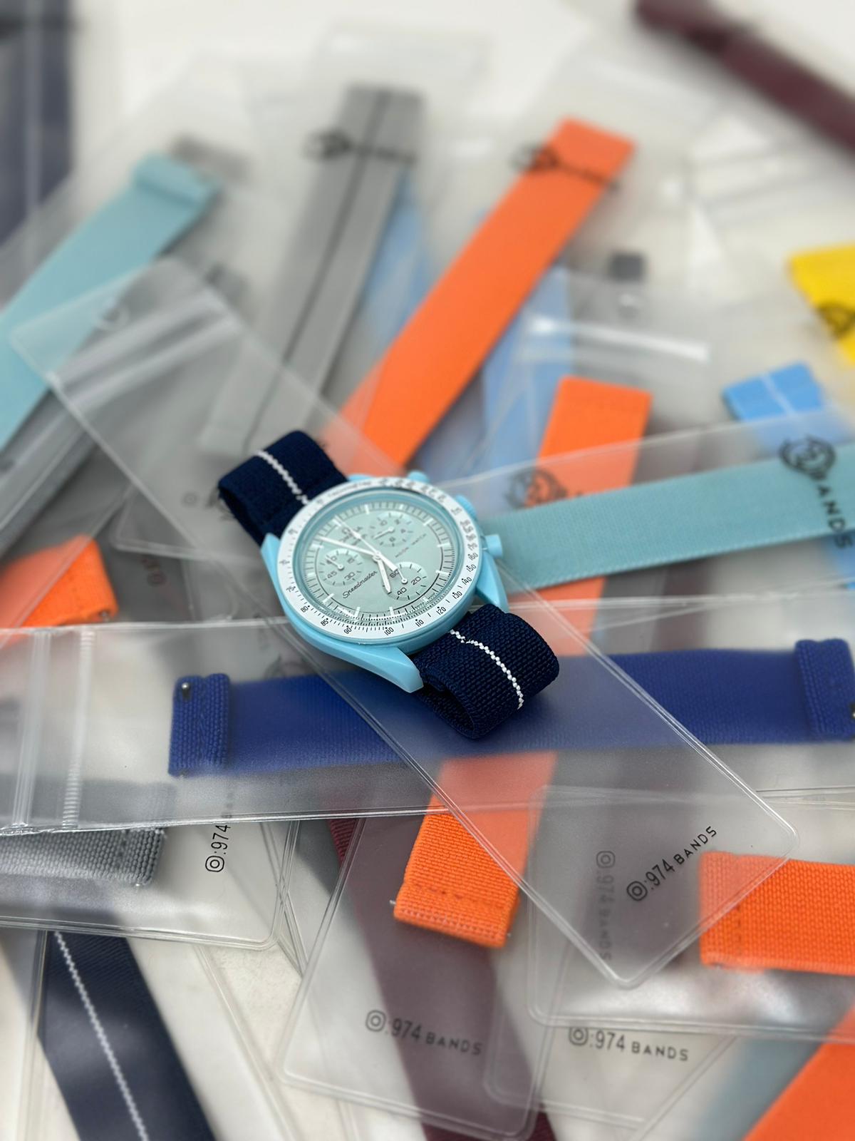 حزام ساعة اوميغا ازرق وابيض