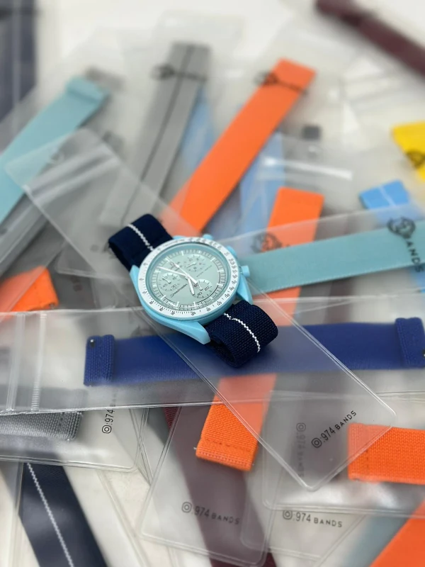 حزام ساعة اوميغا ازرق وابيض